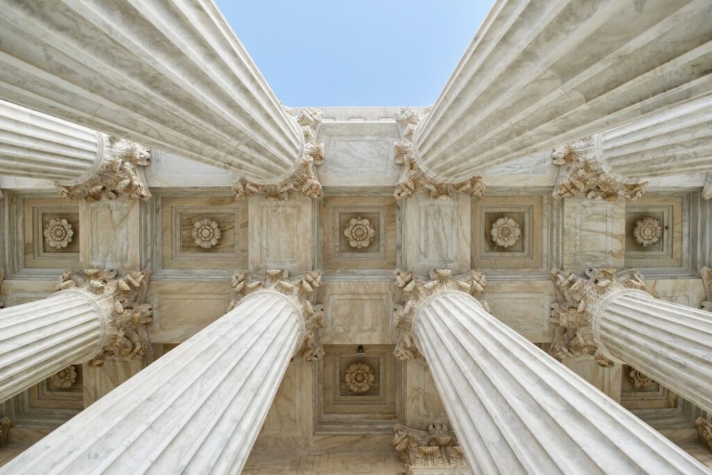 Stone courthouse columns — illustrating a Singapore drug-presumption case study