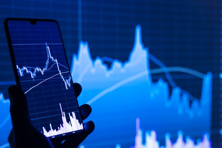 A person viewing a stock chart — illustrating a Singapore insider trading case study
