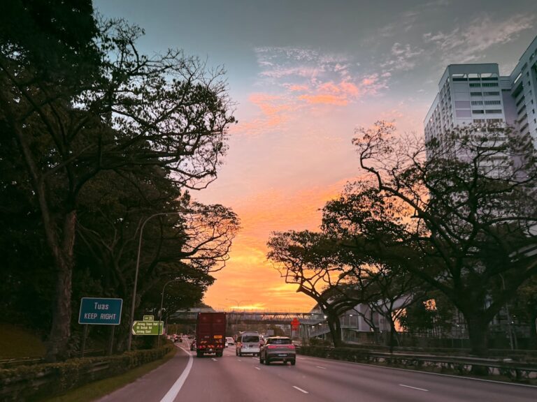 Highway traffic at dusk — Road Traffic Act offences in Singapore