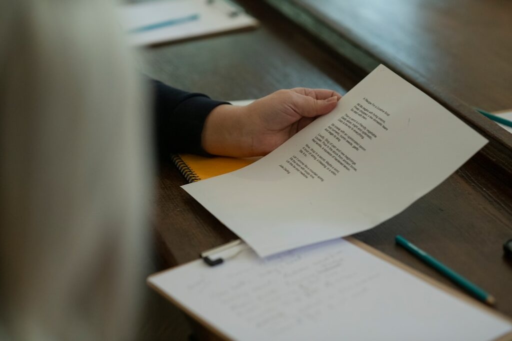A person with a document at a desk — illustrating a Singapore false-information case study