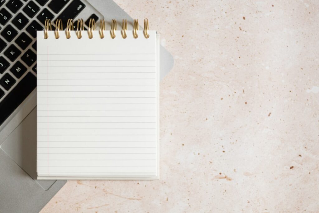 A notebook on a desk — support during a Singapore criminal investigation